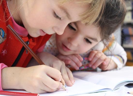 two children colouring