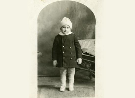 old black and photo of young boy