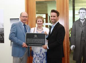 Larry, Catherine and Ryan Keech at the newly named Keech Reading Room and Archives