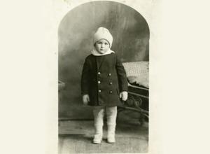 old black and photo of young boy